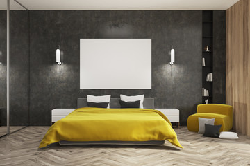 Black and wooden bedroom, yellow bed, poster