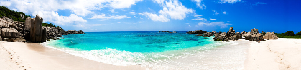 Large Panorama of the pathway for an amazing natural beach, tropical landscape Anse Marron, La Digue, Seychelles