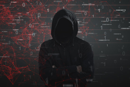 Hacker in a black hoodie, zeros and ones