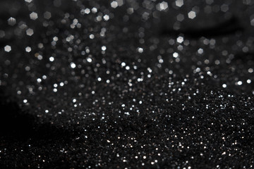 Golden and silver glitter backgound with bokeh abstract effect