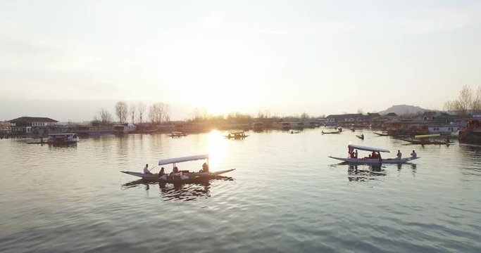 People on boats at sunset, Srinagar aerial