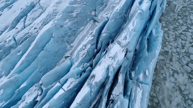 Aerial footage of blue glacier, Fjallsárlón Iceland