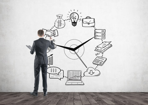 Businessman with a marker, time management