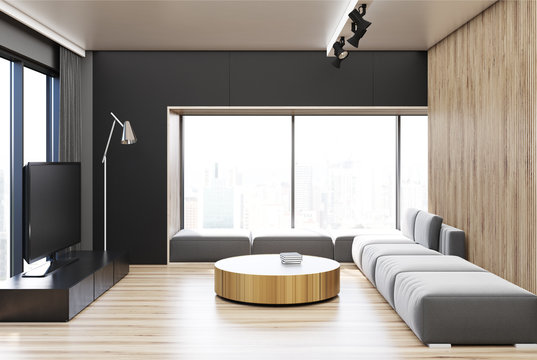 Black and wooden living room, round table