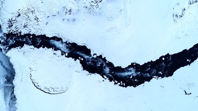 Seljalandsfoss waterfall drone shot in winter, Iceland.