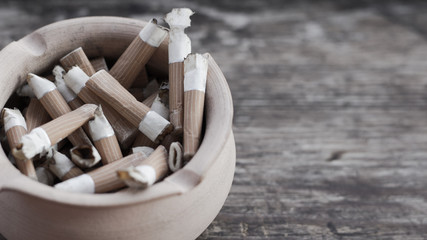 Ashtray with cigarette butts close-up