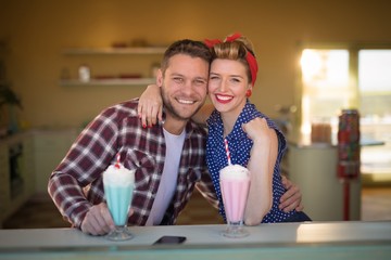 Couple romancing in restaurant
