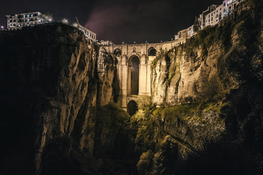 el tajo gorge with ancient puente nuevo illuminated at night, ro