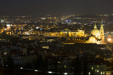 Winter night Prague City with St. Nicholas' Cathedral, Czech Republic