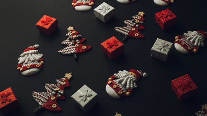 Christmas decorations with christmas motives on balck background.