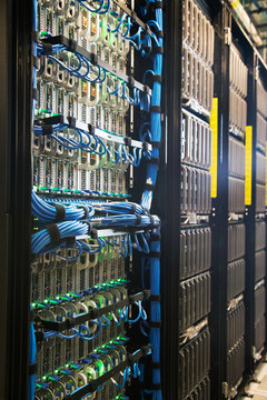 Long bank of servers in server room