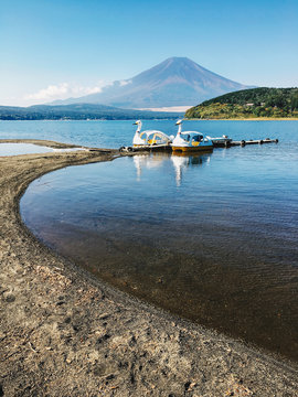 Mount Fuji With Two Swan Pedal Boats on Lake in Foreground