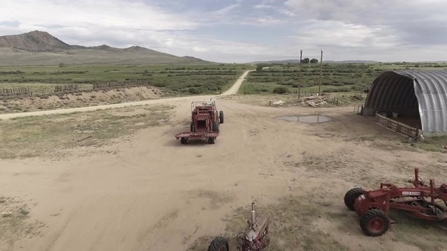 Aerial, Tractors Parked In Countryside