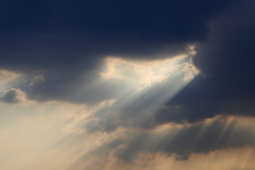 Fototapeta na wymiar sky with clouds and dramatic god light.