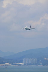 Fototapeta na wymiar 香港空港飛行機の着陸