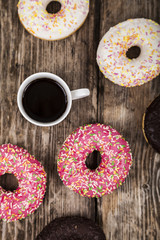 Donuts and a cup of coffee c