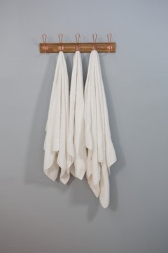 White towels hanging on hook
