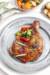 Roasted chicken with vegetables.