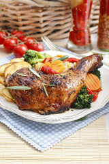 Roasted chicken with vegetables.
