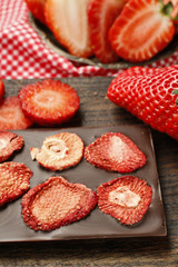 Bar of chocolate with dried strawberries