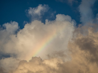 Fototapeta na wymiar rainbow and the cloud