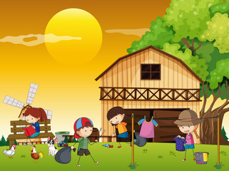 Obraz na płótnie Canvas Kids doing different chores in the farm