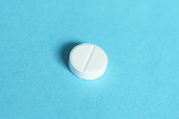 Pills Over Blue Background