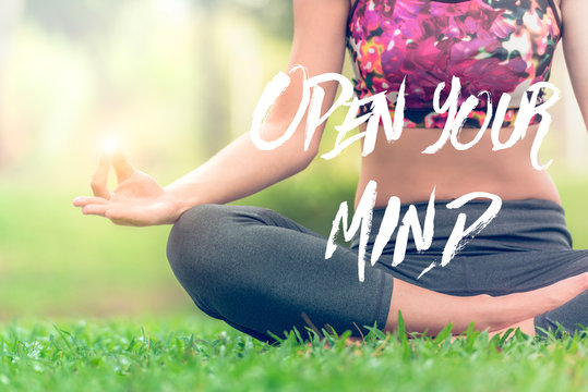Open your mind Positive Relaxation Meditation Chill. Personnal development quote with yoga lotus pose by a woman with light in her hand