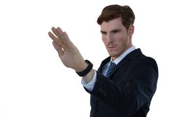 Businessman pretending to use an invisible screen