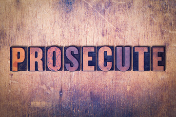 Prosecute Theme Letterpress Word on Wood Background