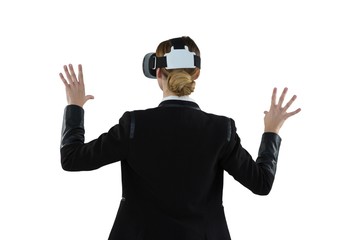 Businesswoman using virtual reality headset