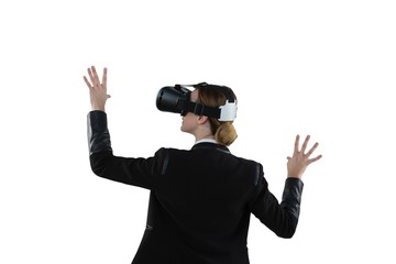 Businesswoman using virtual reality headset