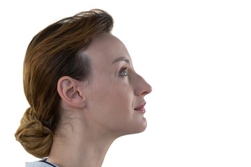 Female executive smiling against white background