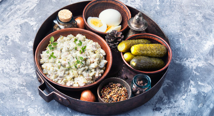 Fototapeta na wymiar Russian meat salad Olivier