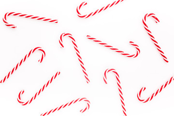 Texture made with Christmas Candy cane on white background. Flat lay, top view.