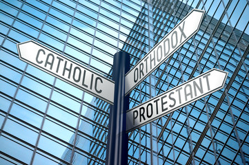 Religion concept (Catholic, Orthodox, Protestant) - crossroads sign, office building