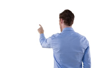 Male executive pretending to use an invisible screen