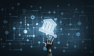 Conceptual image with hand pointing at house or main page icon on dark background