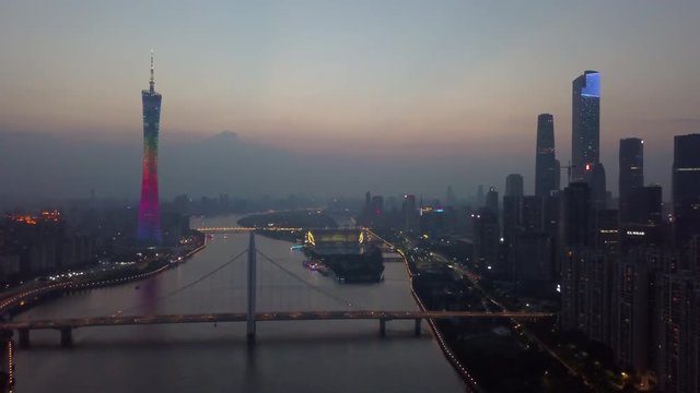 night illuminated guangzhou downtown canton tower river bridge aerial panorama 4k china
