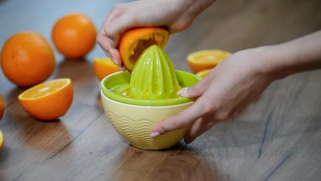 Squeezing fresh orange juice