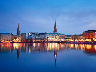 Fototapeta na wymiar Alster Lake and night panorama of Hamburg city