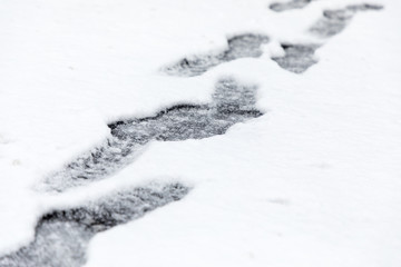 snow with footprints