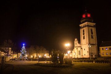 Fototapeta na wymiar Night above historic center of Bechyne with christmas tree. Czech Republic.