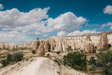 Fototapeta premium Beautiful view of the hills of Cappadocia. One of the sights of Turkey. Tourism, travel, beautiful landscapes, nature.