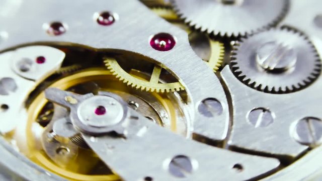 mechanism of a clock close-up of a gear and the spring of chronometer