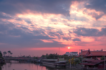 Naklejka premium Thailand rural. Vibrant color panoramic sunset and sky with cloud on a cloudy day