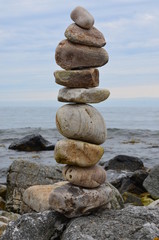 Fototapeta na wymiar Stacked rocks at sea shore