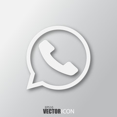 Handset icon in white style with shadow isolated on grey background.