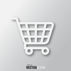 Shopping cart icon in white style with shadow isolated on grey background.