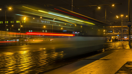 Fototapeta na wymiar night traffic on the urban thoroughfare and road junction